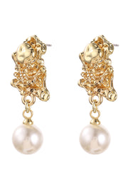 Gold earrings with pearl drops on a white background
