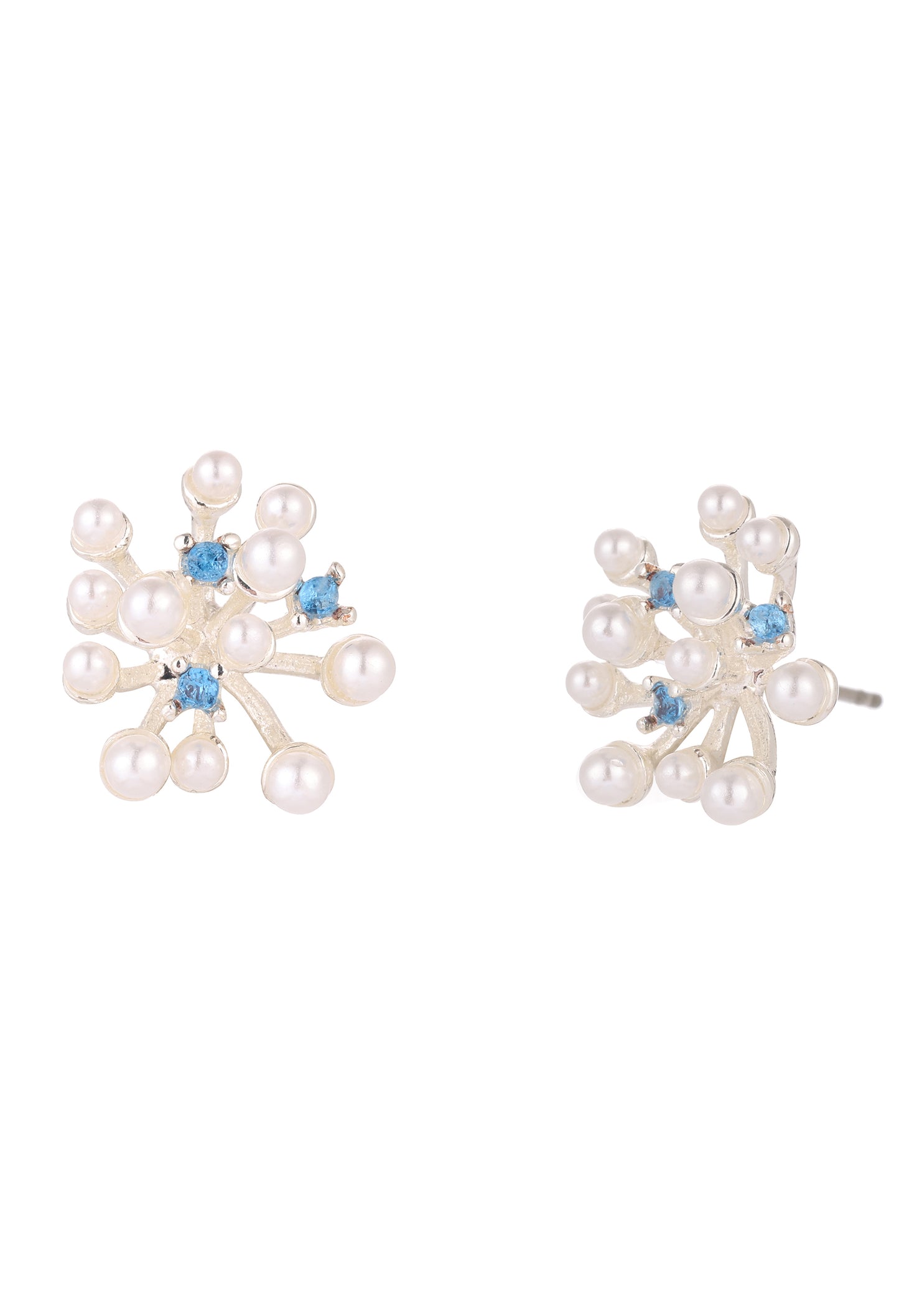 Pair of pearl earrings with blue gemstones on a white background