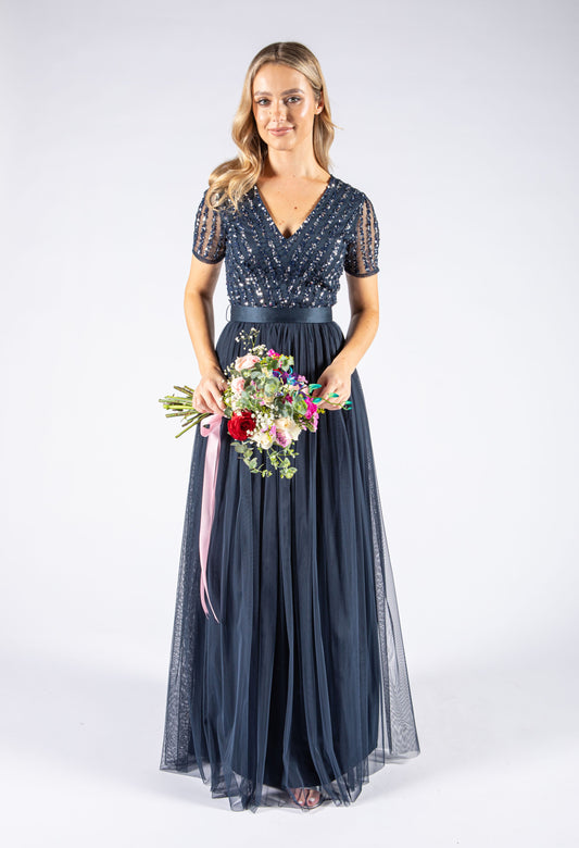 NAVY V NECK SEQUIN AND TULLE DRESS WITH TIE WAIST