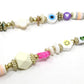 Multicoloured bead phone charm