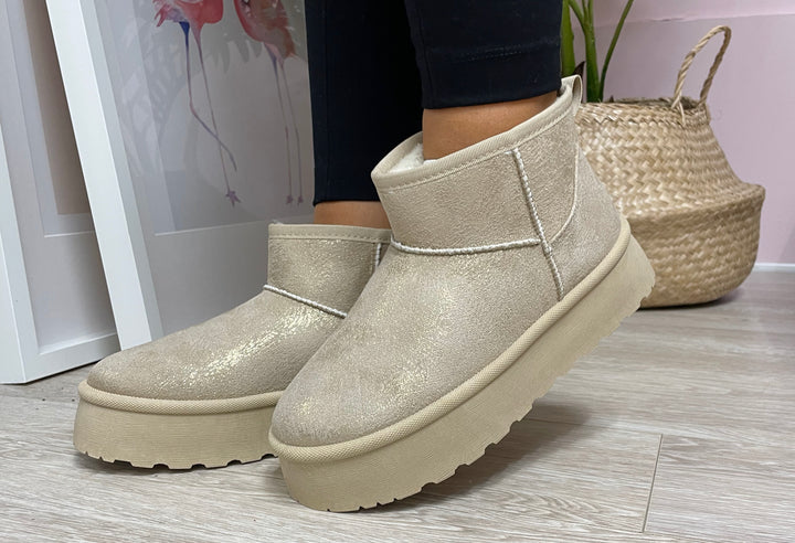 shimmer slip on boot with faux lining and platform sole