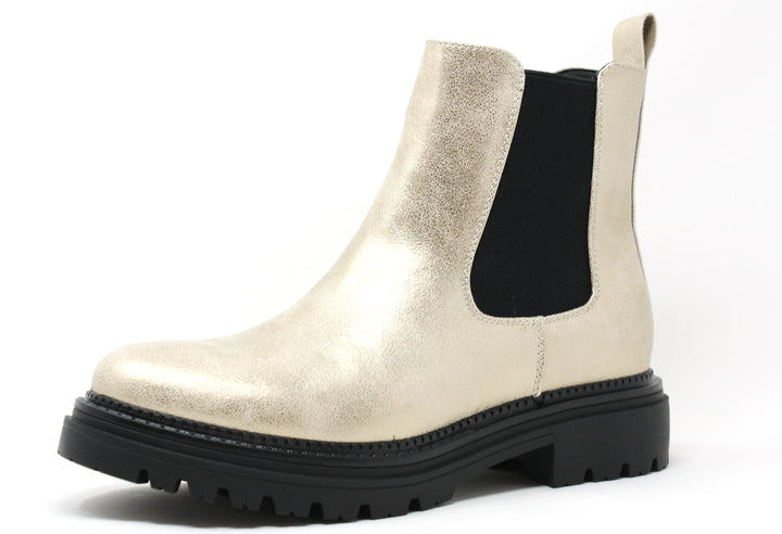 A metallic finish boot with a contrast black sole, featuring a round toe and a block heel.