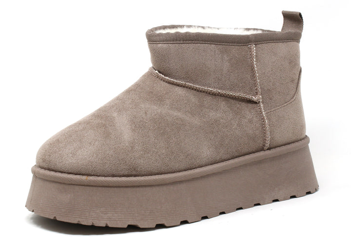 Taupe faux fur lined platform boots with a round toe design.