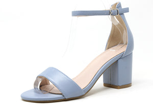 Light blue sandal with block heel on a white background