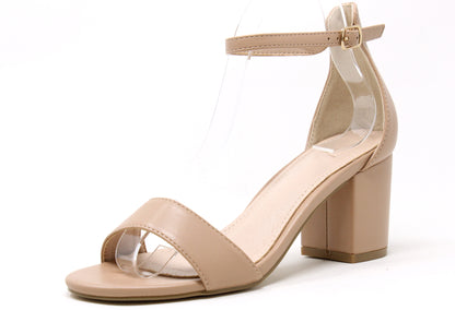 Beige sandal with clear strap on a white background