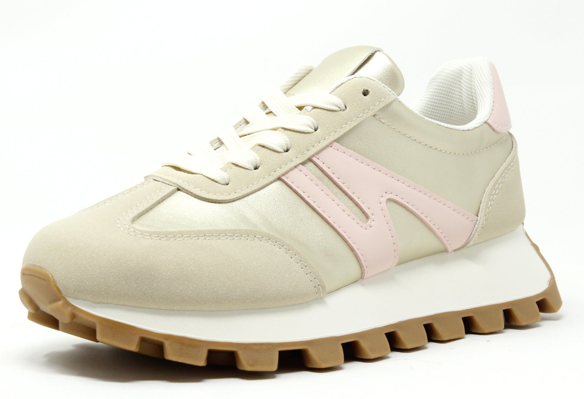 A baby pink sneaker with gold details and a 4cm chunky sole.