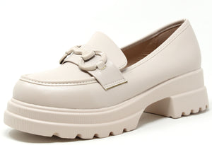 A beige double sole loafer with a round toe and low pitch, featuring a buckle strap and a thick sole.