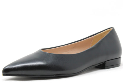 Black pointed-toe flat ballerina shoe on a white background