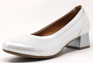 A silver metallic pump with a round toe and low block heel.