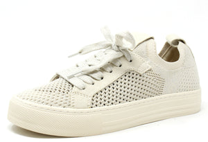 A pair of beige lace-up sneakers with faux suede trims and a platform sole.
