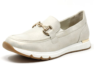 A gold loafer with buckle detail and a comfortable sole.