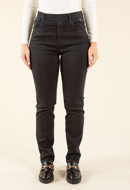 woman wearing a stone wash denim pull on trouser