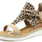 Leopard print sandal with a woven sole on a white background