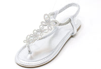 Silver sandal with decorative straps on a white background