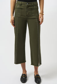 Person wearing green pants on a white background