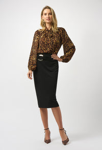 Woman wearing a leopard print blouse and black pencil skirt on a white background