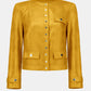 Yellow jacket with button details on a white background