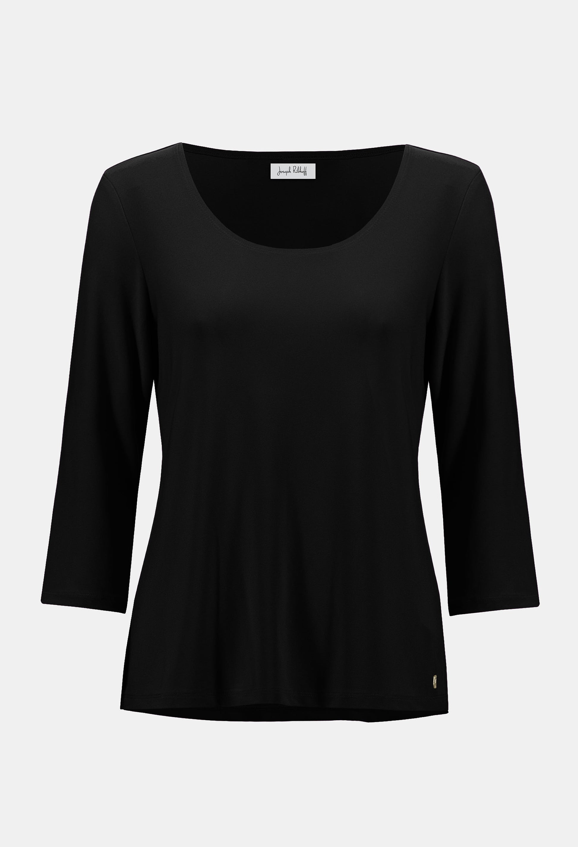 Black long-sleeve top on a light gray background