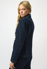 Woman wearing a navy blue jacket on a white background