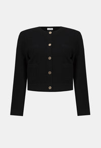 Black cropped cardigan with button details on a white background