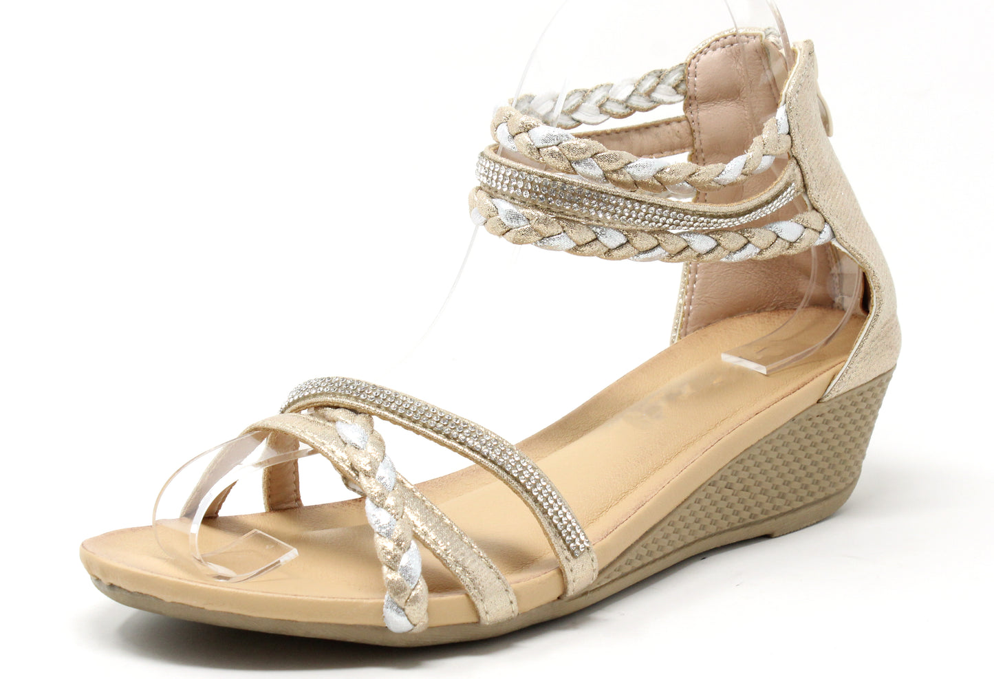 Beige wedge sandal with braided straps on a white background