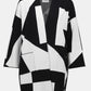 Black and white geometric patterned jacket on a white background