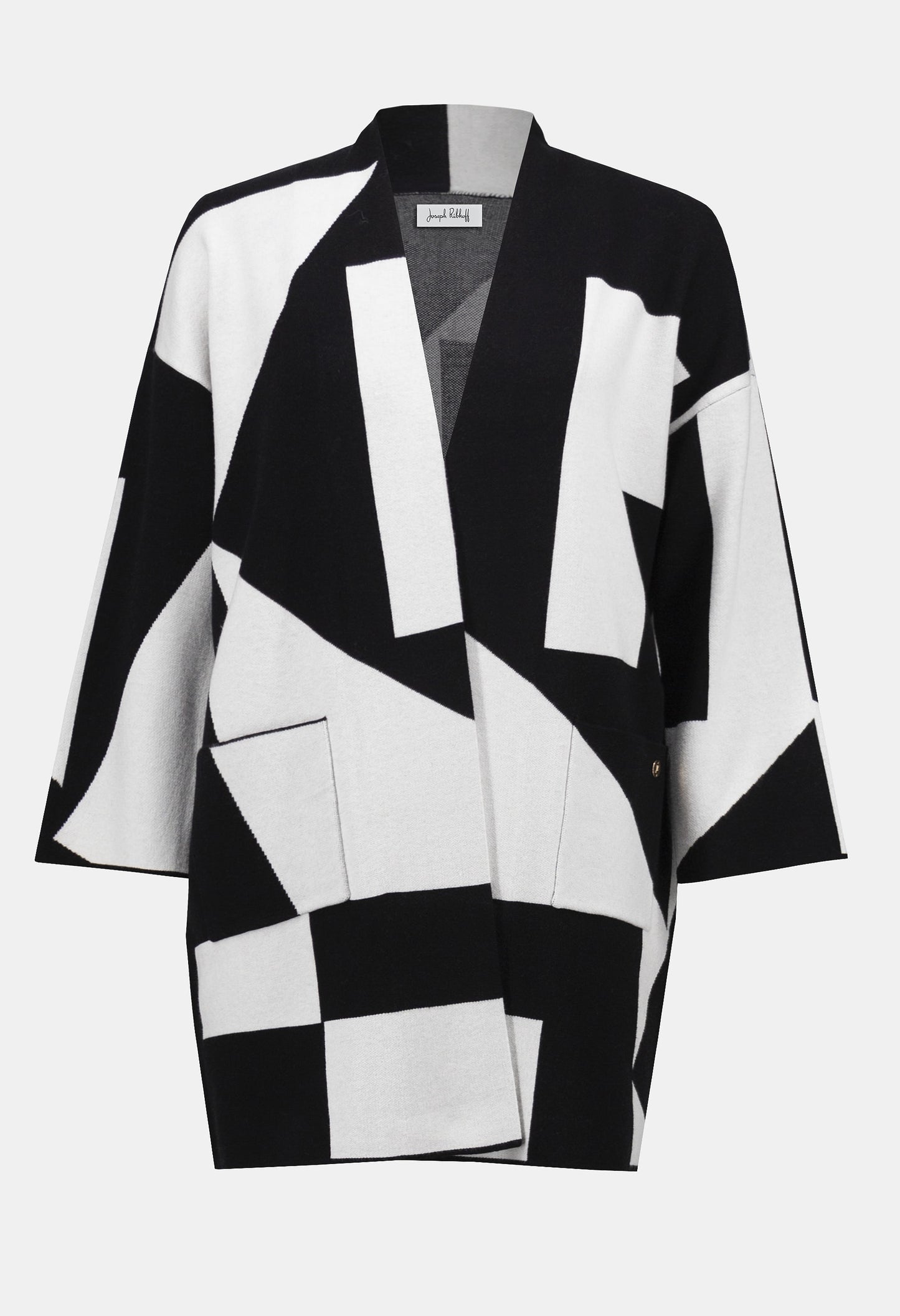 Black and white geometric patterned jacket on a white background