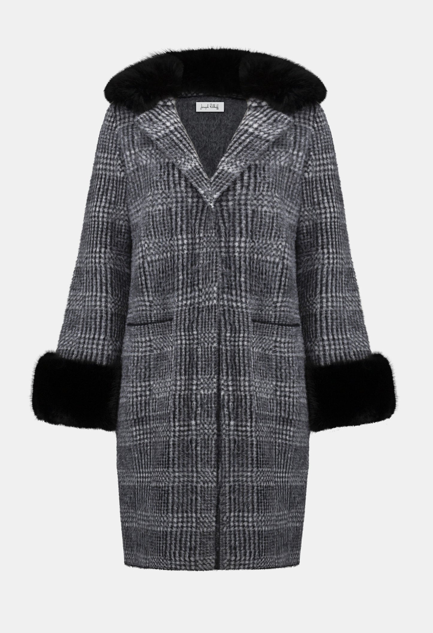Plaid coat with black fur trim on a white background