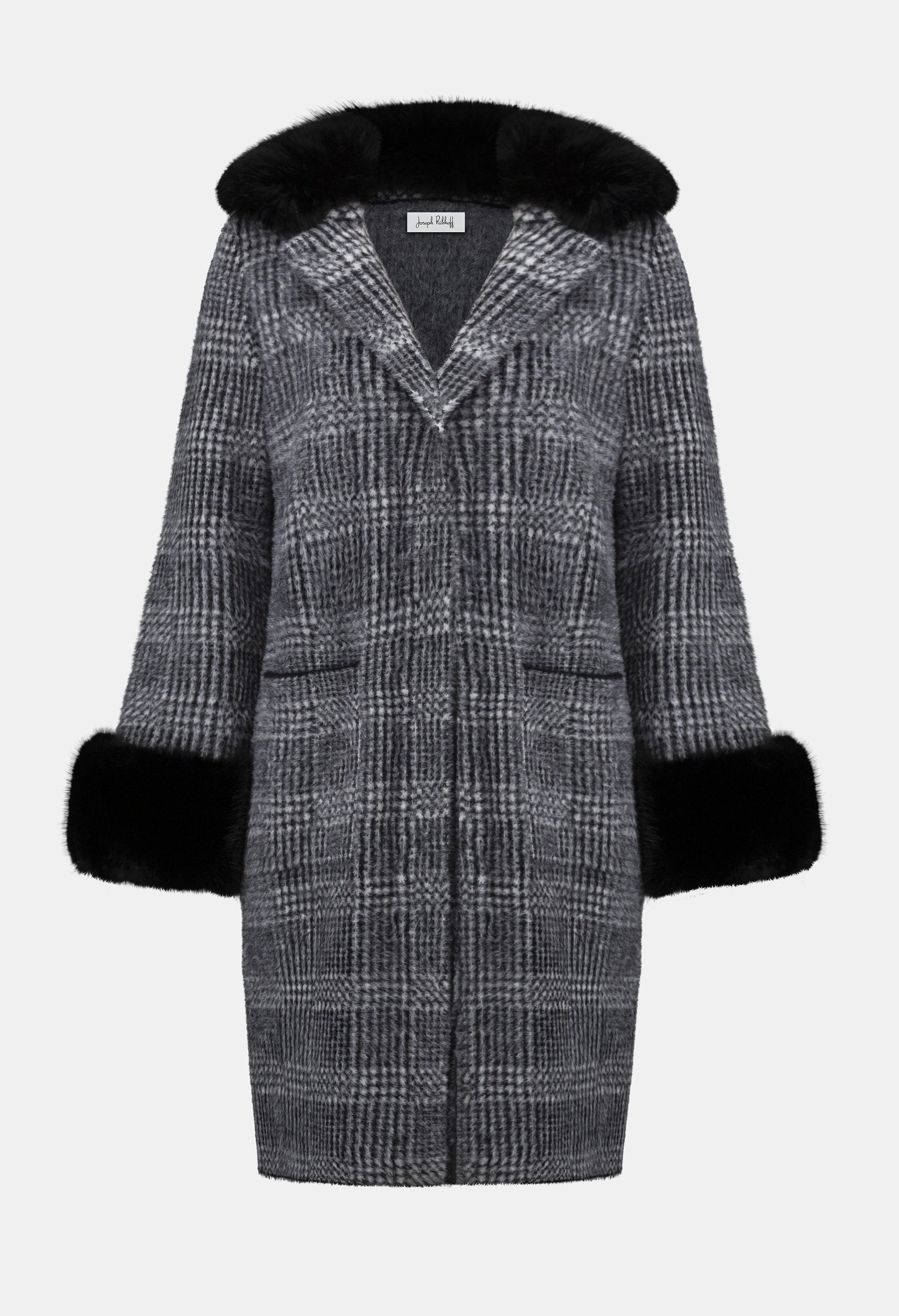 Plaid coat with black fur trim on a white background
