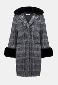 Plaid coat with black fur trim on a white background