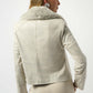 Woman wearing a beige jacket with fur collar on a white background