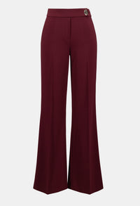 Maroon wide-leg pants on a light gray background