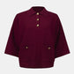 Maroon jacket with gold buttons on a white background