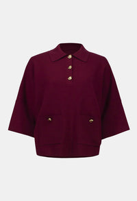 Maroon jacket with gold buttons on a white background