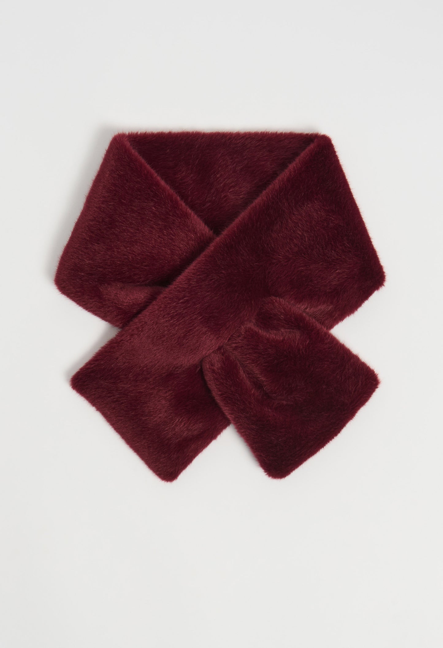 Burgundy scarf on a light gray background