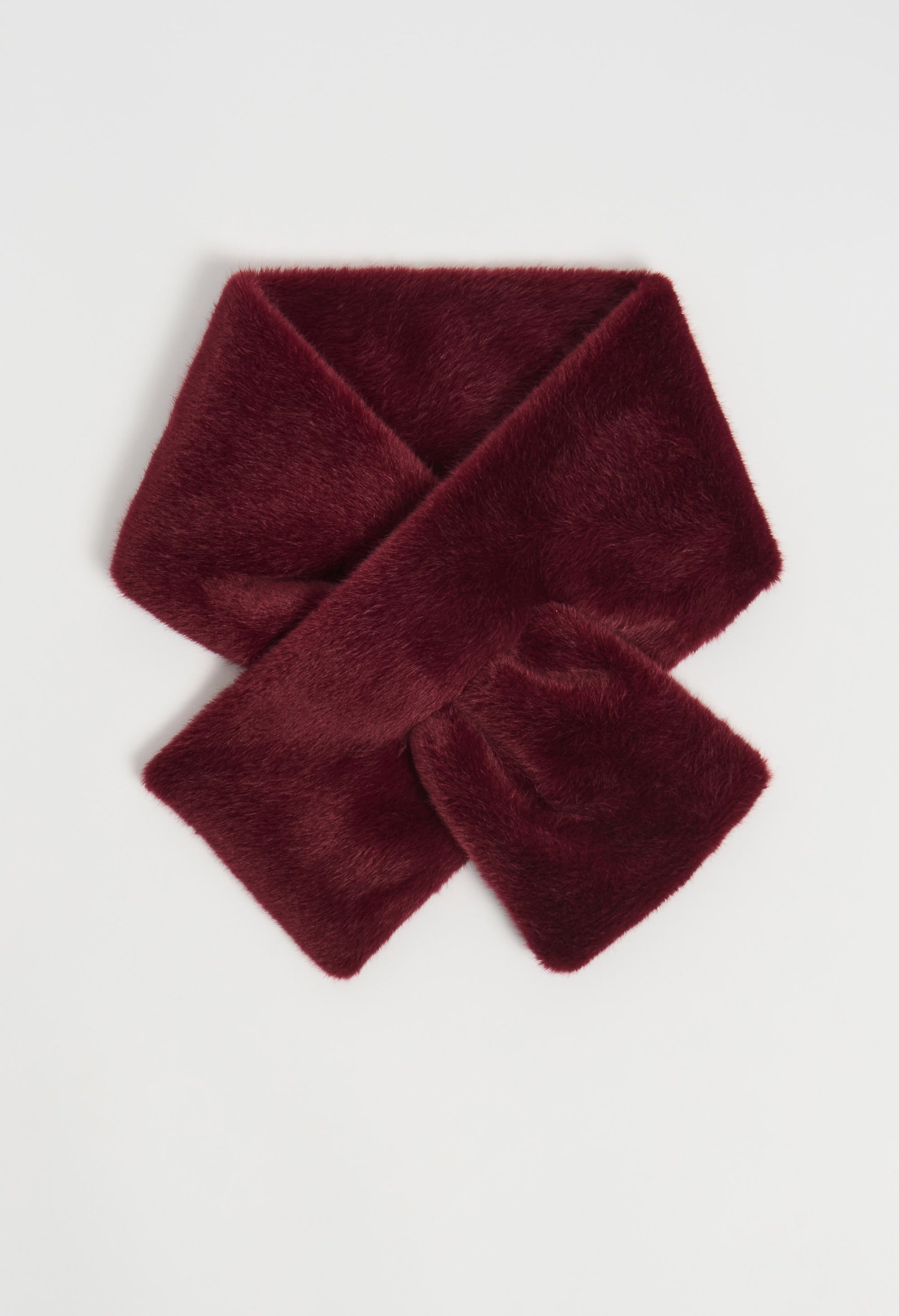 Burgundy scarf on a light gray background