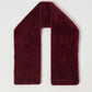 Maroon scarf on a light gray background