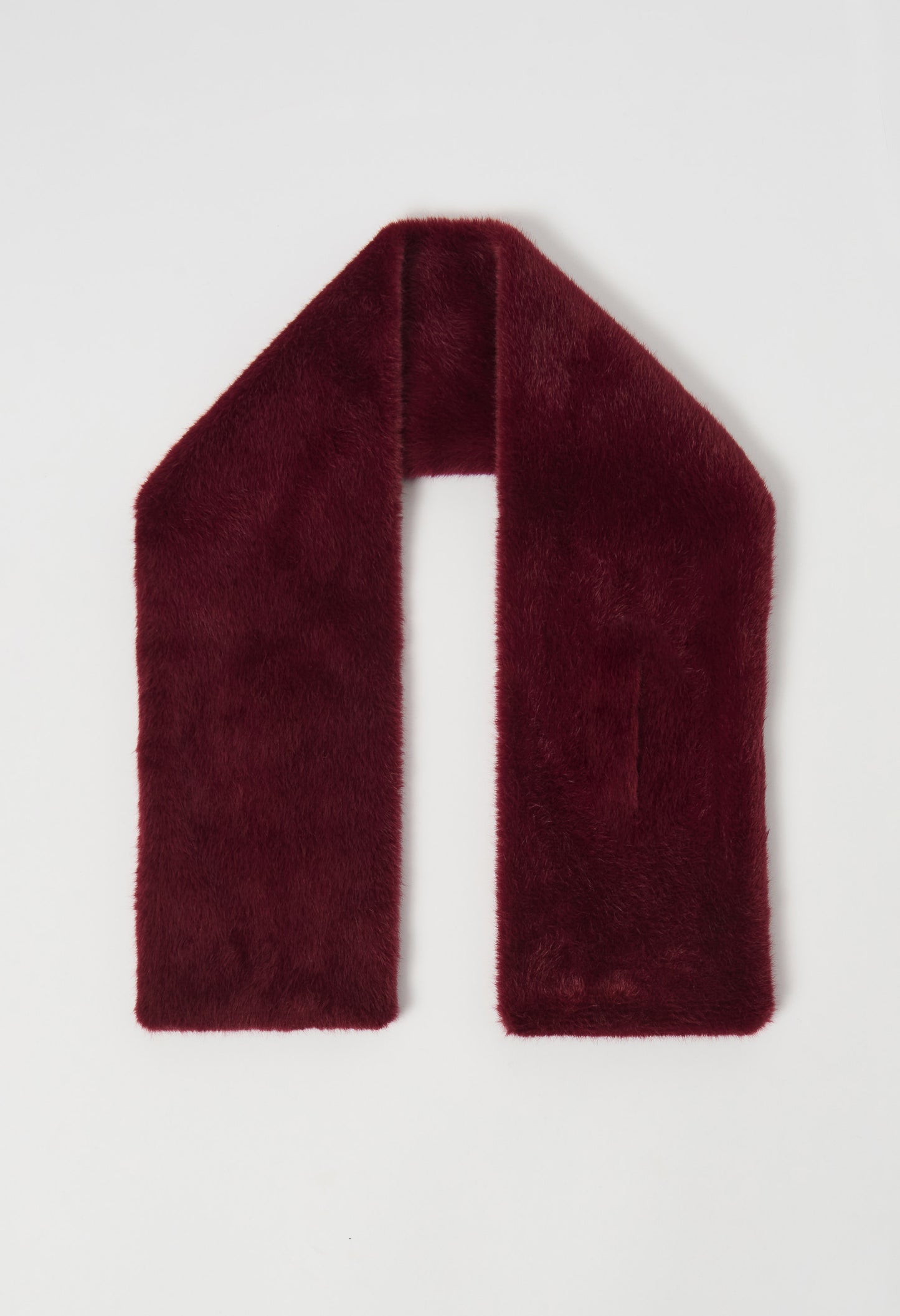 Maroon scarf on a light gray background
