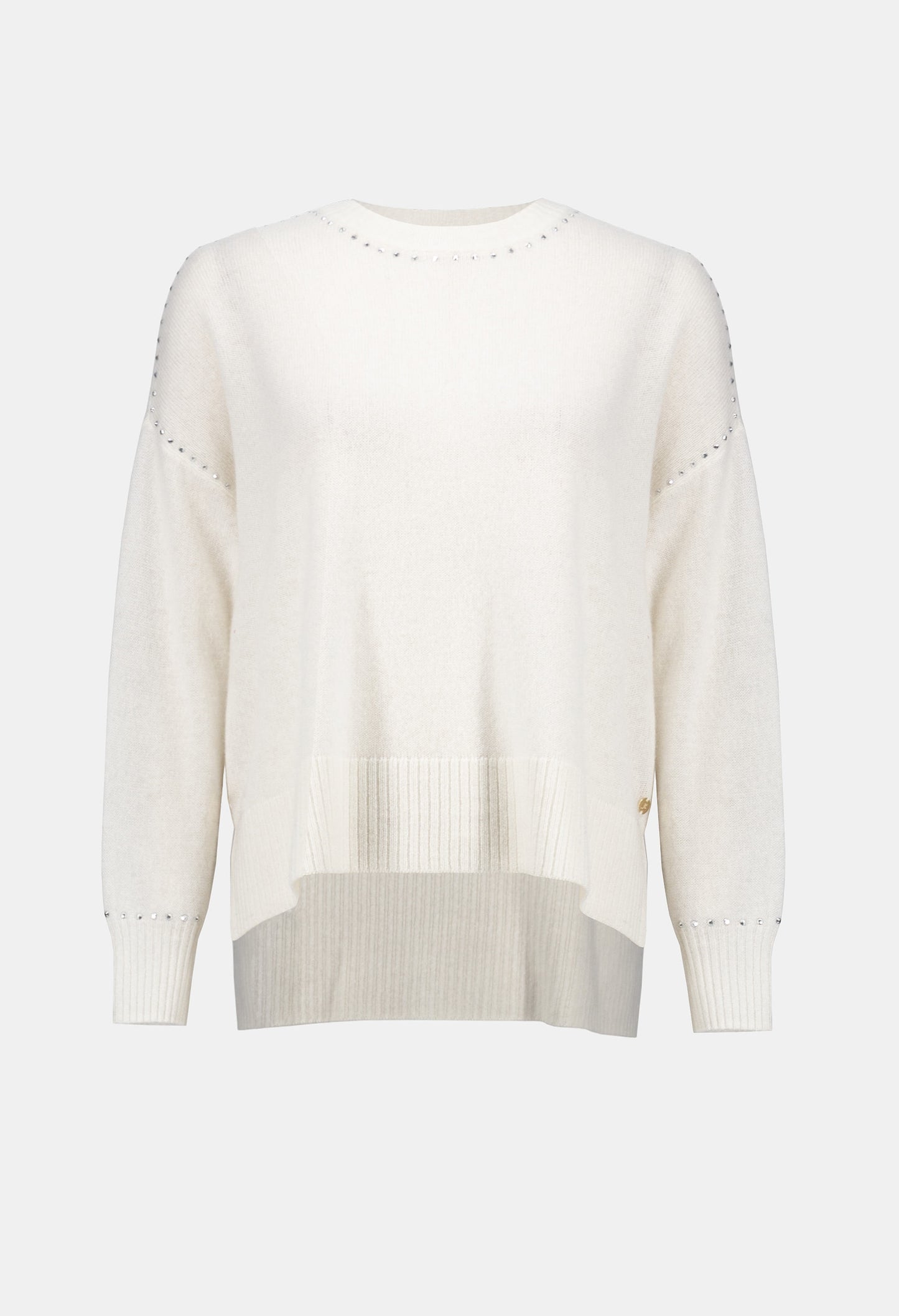White sweater on a light gray background
