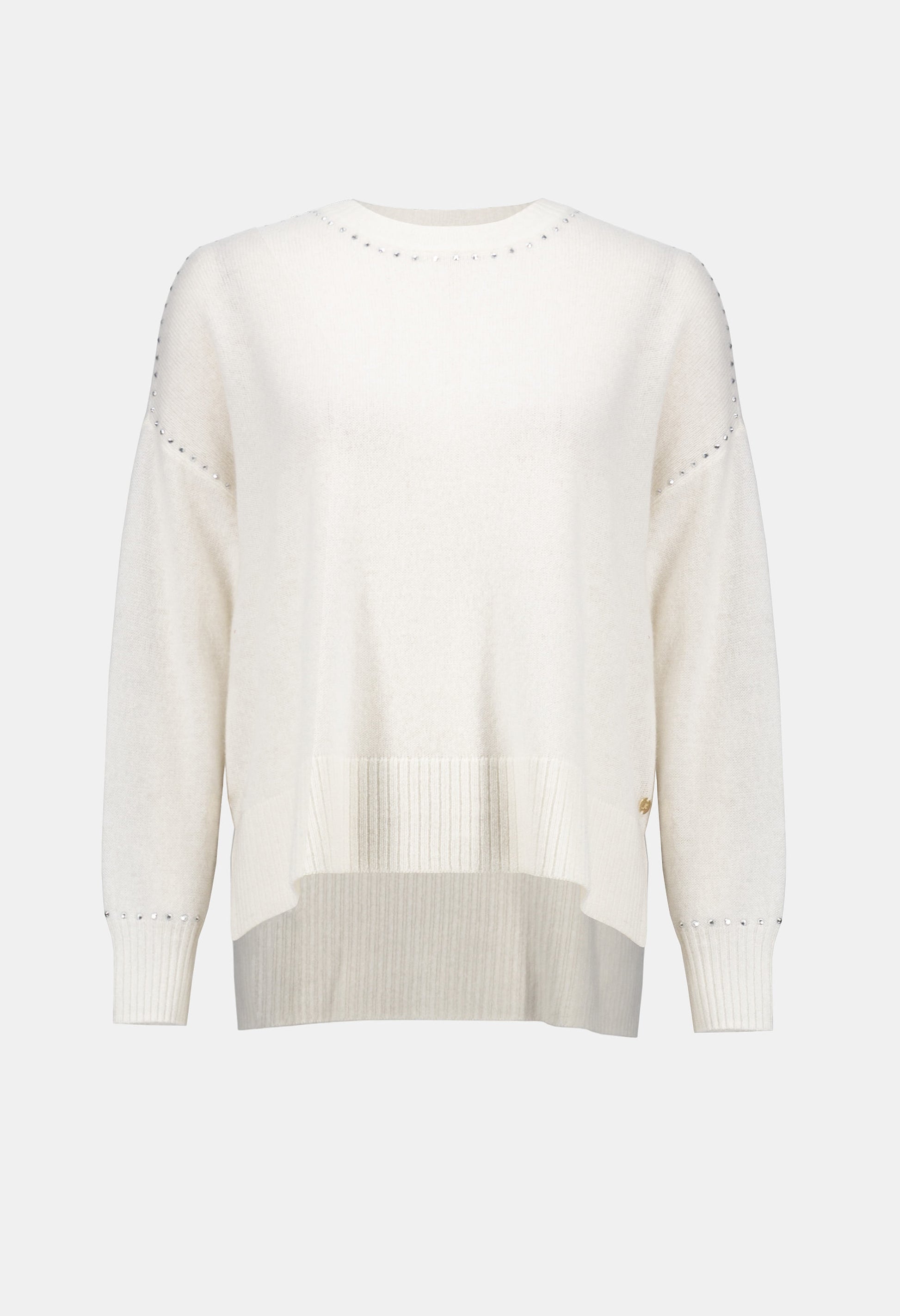 White sweater on a light gray background