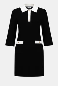 Black dress with white collar and buttons on a white background