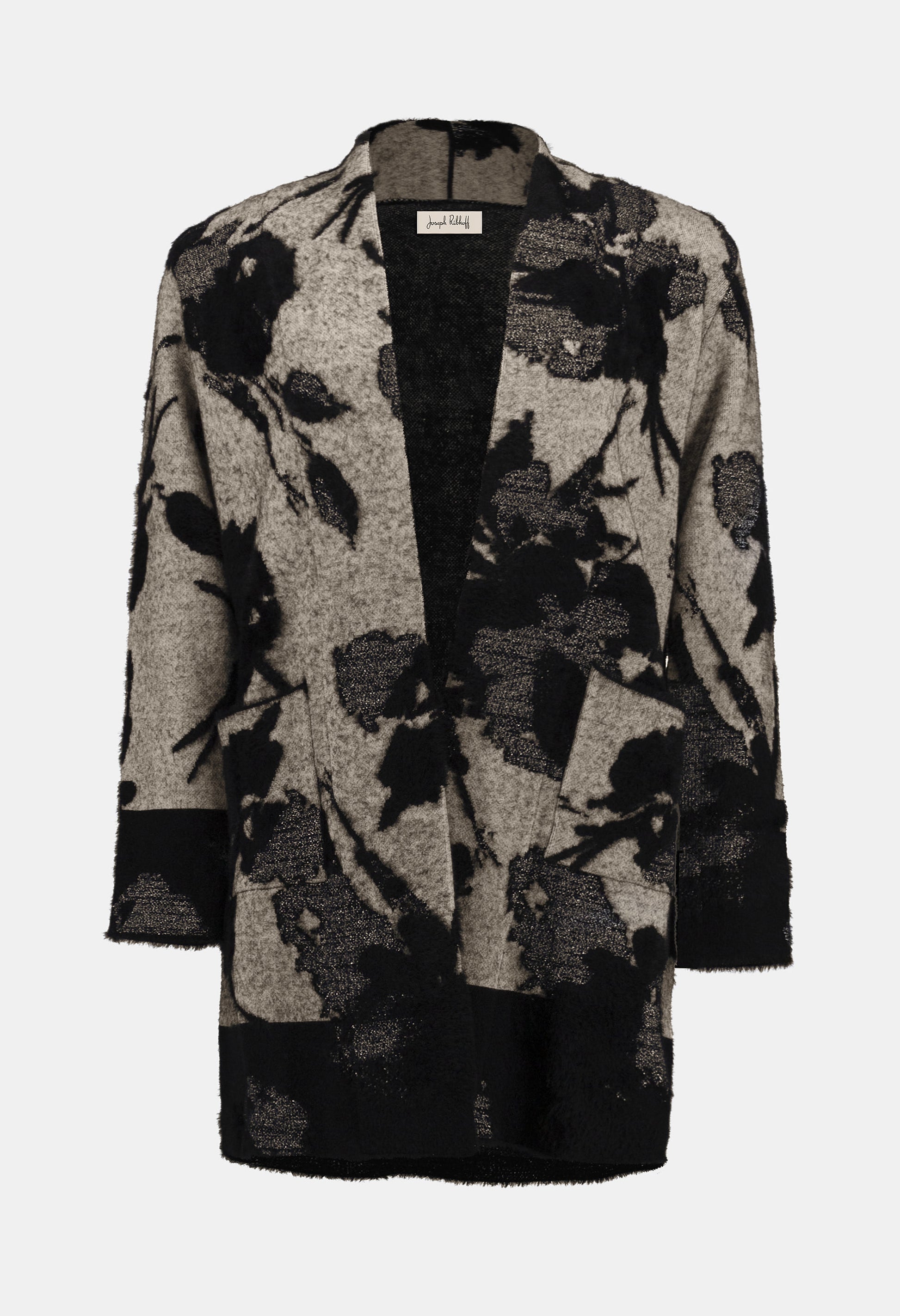 Floral patterned cardigan on a white background