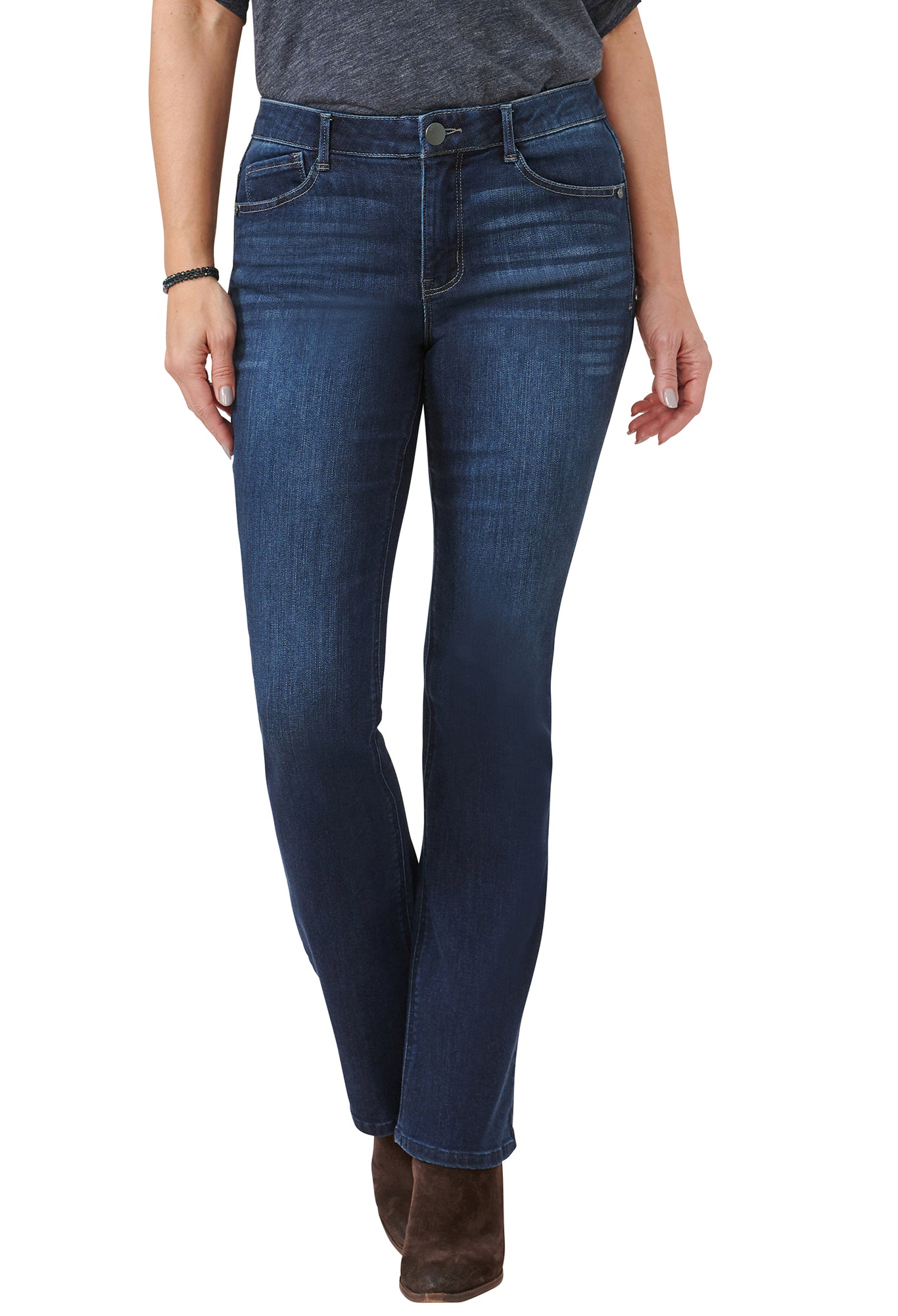 Person wearing blue jeans on a white background