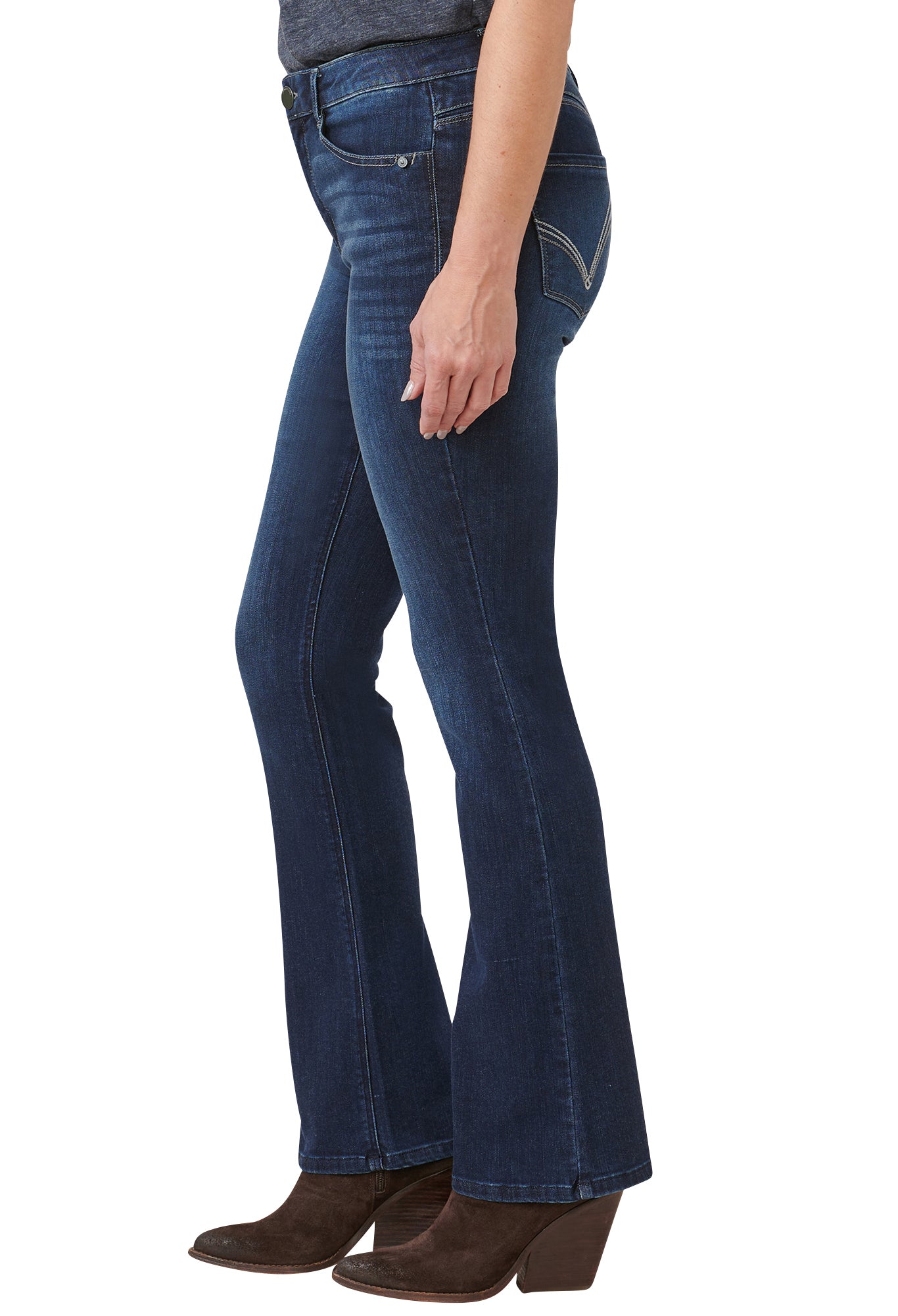 Blue jeans worn by a person on a white background