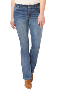 Blue jeans worn by a person on a white background