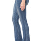 Blue jeans worn by a person on a white background