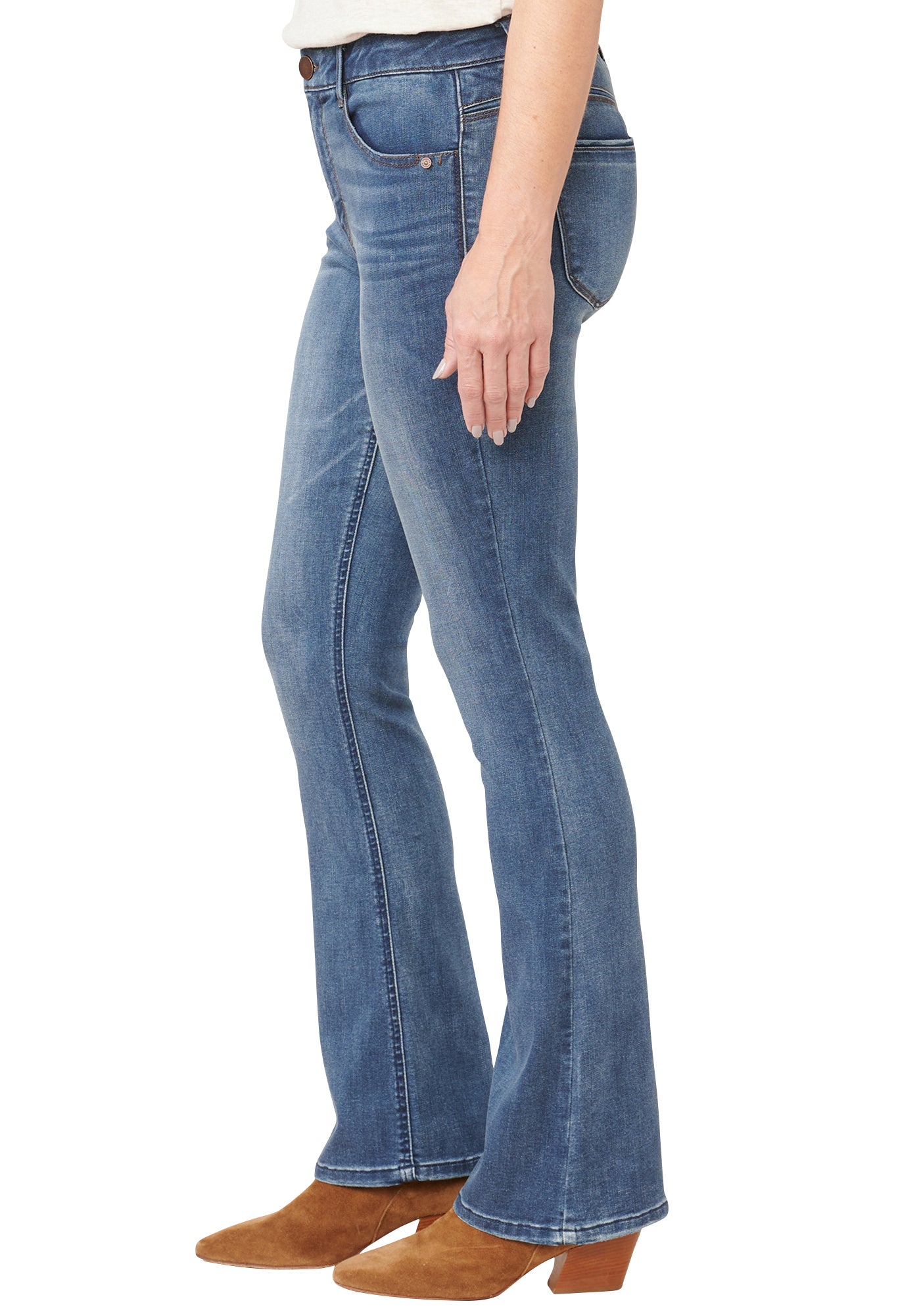 Blue jeans worn by a person on a white background