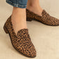 leopard print loafer on the foot
