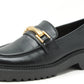 Black loafer with gold buckle on a white background