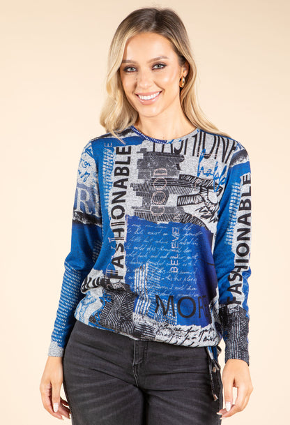 model in blue and grey top on beige background